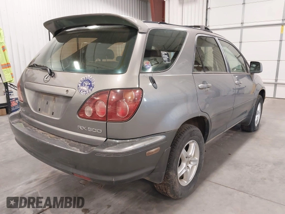2000 Lexus RX 300 z VIN JT6HF10U6Y0129714, wystawiony jako IAAI lot #41641164 z przebiegiem 174 537 mil mil oraz . Historia ofert i sprzedaży dostępna na DreamBid. Obrazek 4.