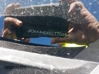 2024 Mazda CX-90 Select z VIN JM3KKAHDXR1170154, wystawiony jako IAAI lot #40852871 z przebiegiem 4 498 mil mil oraz . Historia ofert i sprzedaży dostępna na DreamBid. Obrazek 9.