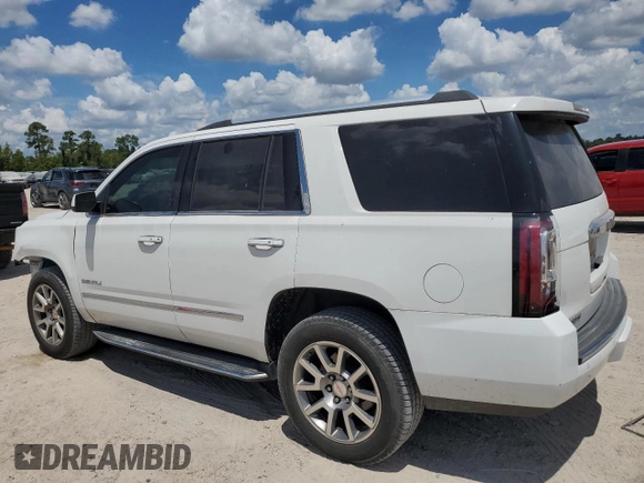 2015 GMC Yukon Denali with VIN 1GKS1CKJ3FR579085, listed as a Copart auction lot 67657084 with 98,456 mi miles and Salvage Title. Bid and sale history available at carsss.com. Image 2.