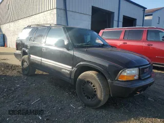 1998 GMC Jimmy SLE with VIN 1GKDT13W6W2543854, listed as a Copart auction lot 76004664 with 157,457 mi miles and Salvage Title. Bid and sale history available at carsss.com. Image 4.