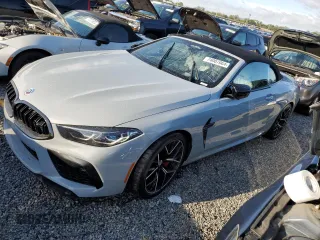 2023 BMW M8 Competition with VIN WBSDZ0C07PCK80455, listed as a Copart auction lot 74007064 with 0 mi miles and Salvage Title. Bid and sale history available at carsss.com. Image 1.