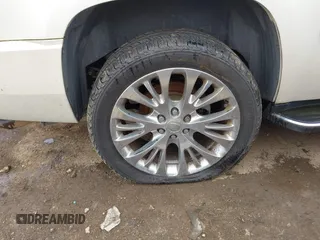 2007 Cadillac Escalade z VIN 1GYFK63837R304030, wystawiony jako IAAI lot #42198618 z przebiegiem 202 093 mil mil oraz . Historia ofert i sprzedaży dostępna na DreamBid. Obrazek 12.