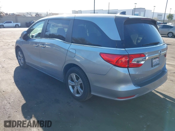2018 Honda Odyssey EX-L with VIN 5FNRL6H71JB089289, listed as a IAAI auction lot 41813322 with 94,933 mi miles and . Bid and sale history available at DreamBid. Image 3.