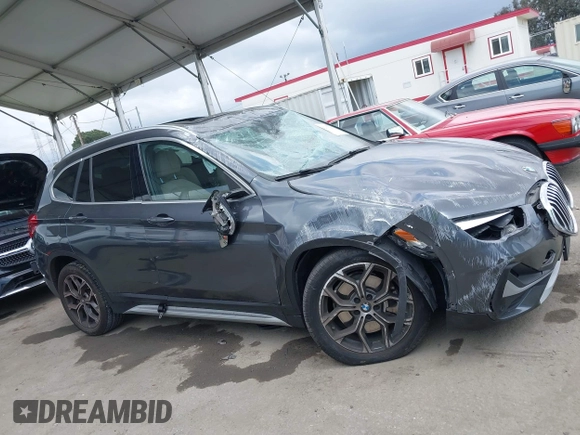 2021 BMW X1 xDrive28i with VIN WBXJG9C03M3M80011, listed as a IAAI auction lot 42137781 with 132,969 mi miles. Bid and sale history available at carsss.com. Image 13.
