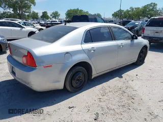 2012 Chevrolet Malibu 1FL with VIN 1G1ZA5E09CF357357, listed as a IAAI auction lot 41810064 with 295,346 mi miles and . Bid and sale history available at DreamBid. Image 4.