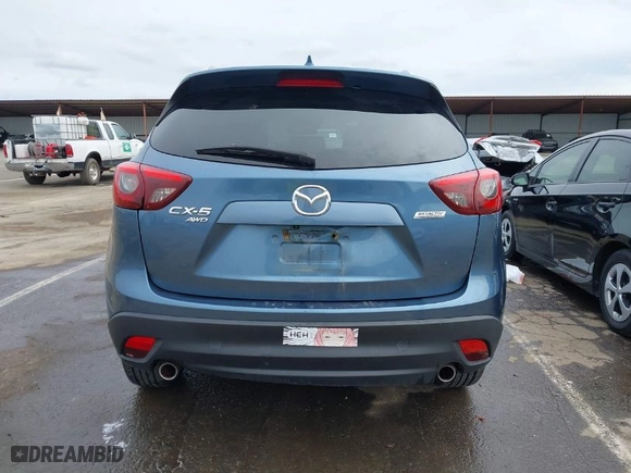 2016 Mazda CX-5 Grand Touring with VIN JM3KE4DY9G0726782, listed as a IAAI auction lot 41720512 with NaN miles. Bid and sale history available at carsss.com. Image 16.