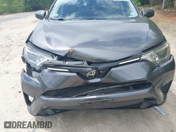 2018 Toyota RAV4 LE z VIN JTMBFREV9JJ742196, wystawiony jako IAAI lot #42242296 z przebiegiem 97 479 mil mil oraz . Historia ofert i sprzedaży dostępna na DreamBid. Obrazek 6.