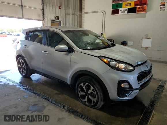 2021 Kia Sportage LX with VIN KNDPMCAC5M7862219, listed as a Copart auction lot 54098215 with 83,736 mi miles and Salvage Title. Bid and sale history available at carsss.com. Image 4.