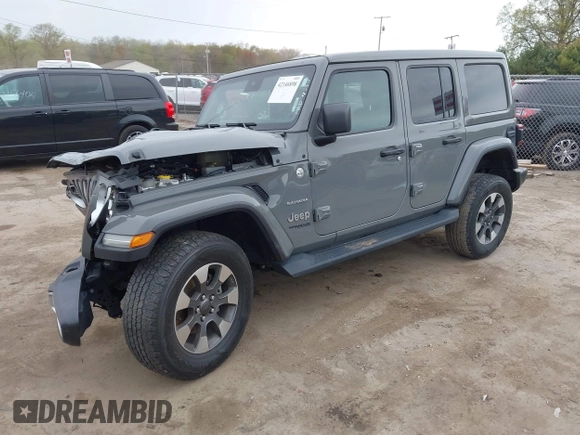 2022 Jeep Wrangler Unlimited Sahara with VIN 1C4HJXEG7NW138105, listed as a IAAI auction lot 42146898 with Not provided miles and . Bid and sale history available at DreamBid. Image 18.