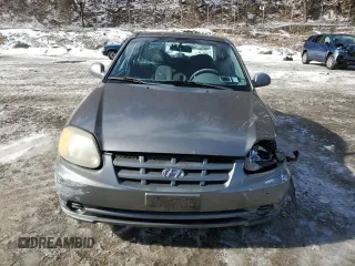 2003 Hyundai Accent GL with VIN KMHCG45C33U469496, listed as a Copart auction lot 45926595 with 77,737 mi miles and Salvage Title. Bid and sale history available at carsss.com. Image 5.