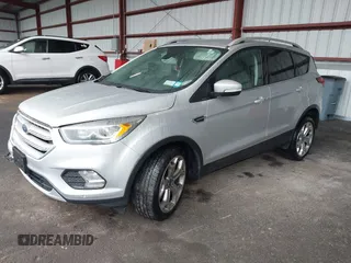 2019 Ford Escape Titanium with VIN 1FMCU9J9XKUA37695, listed as a IAAI auction lot 41868388 with 50,095 mi miles. Bid and sale history available at carsss.com. Image 17.
