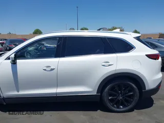 2023 Mazda CX-9 Touring Plus with VIN JM3TCBAY7P0636047, listed as a IAAI auction lot 42309618 with 20,821 mi miles and . Bid and sale history available at DreamBid. Image 14.