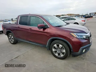 2019 Honda Ridgeline RTL-T with VIN 5FPYK2F60KB002573, listed as a Copart auction lot 63570755 with 111,388 mi miles and Salvage title. Bid and sale history available at DreamBid. Image 4.