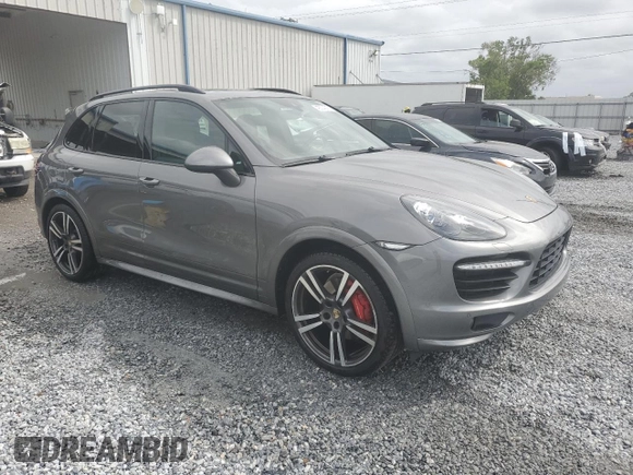 2014 Porsche Cayenne GTS с VIN WP1AD2A22ELA70950, выставлен на аукционе Copart как лот 48324015 с пробегом 75 310 миль миль и На запчасти • Non repairable. История ставок и продаж доступна на DreamBid. Изображение 4.