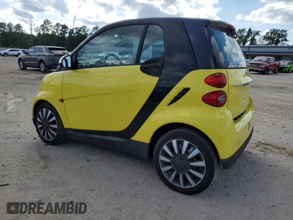 2010 Smart fortwo Pure z VIN WMEEJ3BAXAK371054, wystawiony jako Copart lot #71819294 z przebiegiem 103 177 mil mil oraz Szkoda całkowita • Salvage title. Historia ofert i sprzedaży dostępna na DreamBid. Obrazek 2.