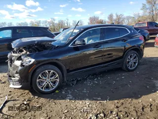 2019 BMW X2 xDrive28i with VIN WBXYJ5C51KEF83761, listed as a Copart auction lot 80027824 with 65,436 mi miles and Salvage Title. Bid and sale history available at carsss.com. Image 1.