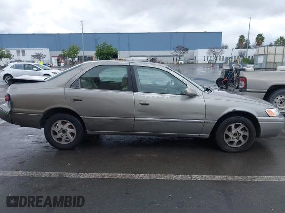1998 Toyota Camry LE z VIN JT2BG22K7W0225872, wystawiony jako IAAI lot #41252434 z przebiegiem 160 763 mil mil oraz . Historia ofert i sprzedaży dostępna na DreamBid. Obrazek 13.