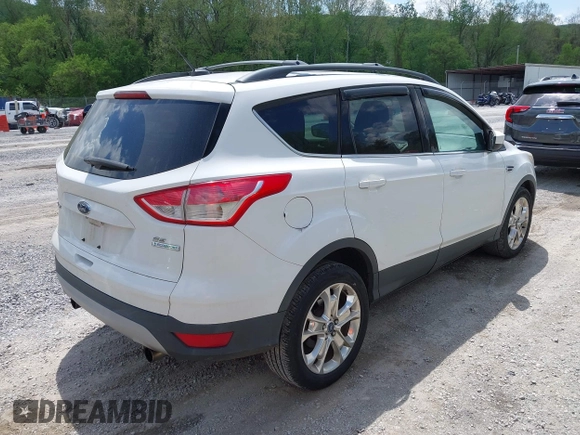 2013 Ford Escape SE with VIN 1FMCU0G90DUB37052, listed as a IAAI auction lot 42132973 with 169,975 mi miles and . Bid and sale history available at DreamBid. Image 4.