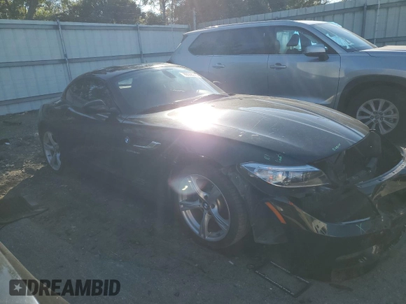 2014 BMW Z4 sDrive28i with VIN WBALL5C59EE717433, listed as a Copart auction lot 89358295 with 133,704 mi miles and Salvage Title. Bid and sale history available at carsss.com. Image 4.