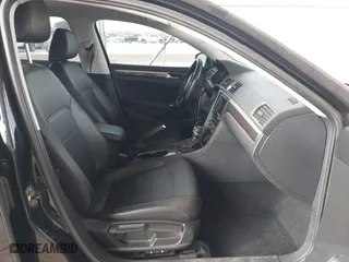 2017 Volkswagen Passat 1.8T SE w/Technology with VIN 1VWGT7A36HC074702, listed as a IAAI auction lot 41805024 with 124,857 mi miles. Bid and sale history available at carsss.com. Image 5.
