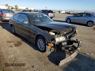 1999 BMW 3 Series 328is with VIN WBABG133XXET07976, listed as a Copart auction lot 67804724 with 139,337 mi miles and Salvage Title. Bid and sale history available at carsss.com. Image 4.