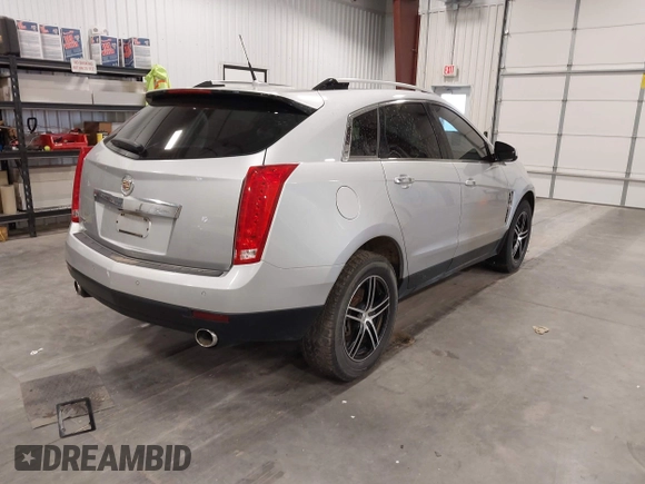 2010 Cadillac SRX Luxury Collection z VIN 3GYFNDEY0AS575446, wystawiony jako IAAI lot #42308817 z przebiegiem 165 402 mil mil oraz . Historia ofert i sprzedaży dostępna na DreamBid. Obrazek 4.