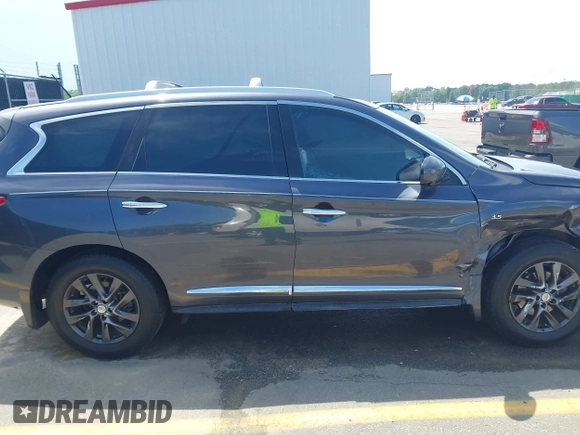 2014 Infiniti QX60 with VIN 5N1AL0MM6EC551107, listed as a IAAI auction lot 42094400 with 161,861 mi miles and . Bid and sale history available at DreamBid. Image 13.