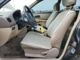 1998 Subaru Impreza L with VIN JF1GF4354WG805257, listed as a Copart auction lot 73696134 with 141,441 mi miles and Salvage title. Bid and sale history available at DreamBid. Image 7.
