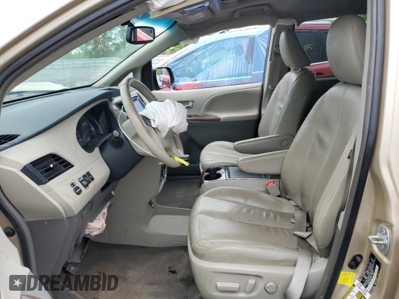 2012 Toyota Sienna XLE with VIN 5TDDK3DC1CS047265, listed as a Copart auction lot 58500275 with 203,548 mi miles and Salvage title. Bid and sale history available at DreamBid. Image 7.
