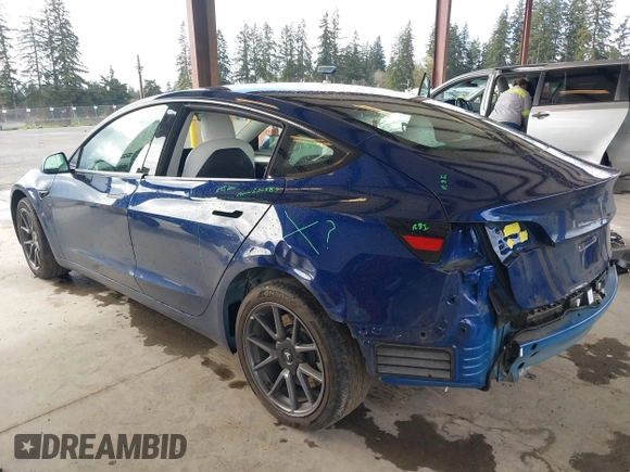 2022 Tesla Model 3 Long Range with VIN 5YJ3E1EB3NF267365, listed as a IAAI auction lot 41996594 with 32,687 mi miles and . Bid and sale history available at DreamBid. Image 3.