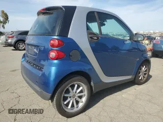 2009 Smart fortwo Pure with VIN WMEEJ31XX9K235766, listed as a Copart auction lot 54985845 with 75,708 mi miles and Clean Title. Bid and sale history available at carsss.com. Image 3.