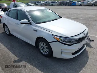 2016 Kia Optima LX z VIN KNAGT4L34G5102639, wystawiony jako IAAI lot #41934547 z przebiegiem 126 270 mil mil oraz . Historia ofert i sprzedaży dostępna na DreamBid. Obrazek 1.