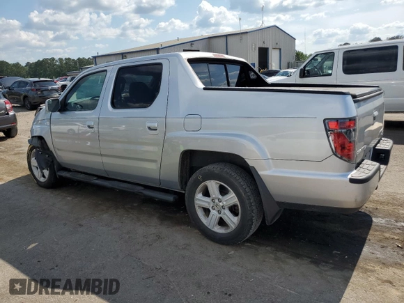 2014 Honda Ridgeline RTL with VIN 5FPYK1F57EB002835, listed as a Copart auction lot 54748905 with 111,253 mi miles and Salvage title. Bid and sale history available at DreamBid. Image 2.