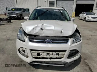 2016 Ford Escape Titanium with VIN 1FMCU9J94GUB31594, listed as a Copart auction lot 51690565 with 119,699 mi miles and Salvage Title. Bid and sale history available at DreamBid. Image 5.