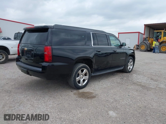 2016 Chevrolet Suburban LT with VIN 1GNSKHKC4GR233059, listed as a IAAI auction lot 42137869 with 115,571 mi miles. Bid and sale history available at carsss.com. Image 4.