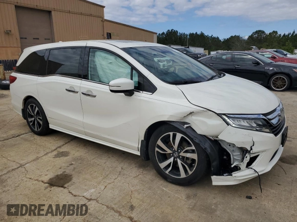 2019 Honda Odyssey Elite with VIN 5FNRL6H99KB013578, listed as a Copart auction lot 49246685 with 54,025 mi miles and Salvage title. Bid and sale history available at DreamBid. Image 4.