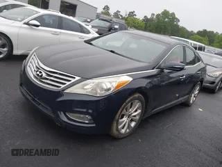 2012 Hyundai Azera z VIN KMHFG4JG1CA121395, wystawiony jako IAAI lot #42355924 z przebiegiem 107 084 mil mil oraz . Historia ofert i sprzedaży dostępna na DreamBid. Obrazek 2.