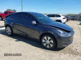 2024 Tesla Model Y Long Range z VIN 7SAYGDEE8RA262082, wystawiony jako IAAI lot #41834216 z przebiegiem 11 536 mil mil oraz . Historia ofert i sprzedaży dostępna na DreamBid. Obrazek 1.