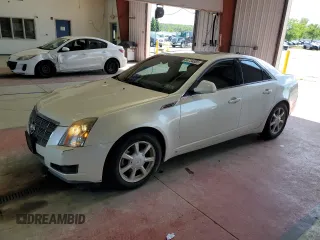 2008 Cadillac CTS AWD with VIN 1G6DG577580215644, listed as a Copart auction lot 64734855 with 128,019 mi miles and Salvage title. Bid and sale history available at DreamBid. Image 1.