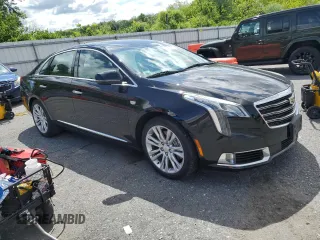 2018 Cadillac XTS Luxury z VIN 2G61M5S33J9118728, wystawiony jako Copart lot #58357685 z przebiegiem 153 970 mil mil oraz Czysty tytuł • Clean title. Historia ofert i sprzedaży dostępna na DreamBid. Obrazek 4.