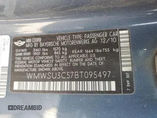 2011 MINI Hardtop z VIN WMWSU3C57BT095497, wystawiony jako Copart lot #55972645 z przebiegiem 132 947 mil mil oraz Szkody całkowita. Historia ofert i sprzedaży dostępna na DreamBid. Obrazek 12.