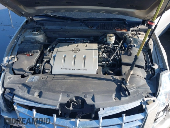 2008 Cadillac DTS 1SC z VIN 1G6KD57Y38U198313, wystawiony jako IAAI lot #42012714 z przebiegiem Nie podano mil oraz . Historia ofert i sprzedaży dostępna na DreamBid. Obrazek 10.