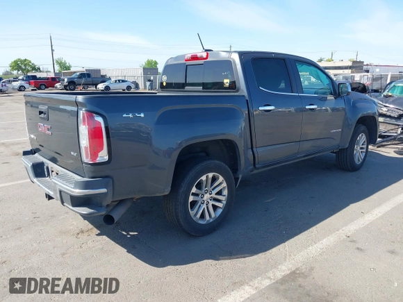 2016 GMC Canyon 4WD SLT with VIN 1GTP6DE15G1323650, listed as a IAAI auction lot 42097101 with 240,662 mi miles. Bid and sale history available at carsss.com. Image 4.