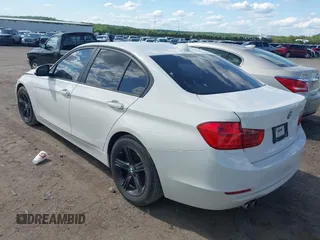 2014 BMW 3 Series 328i with VIN WBA3A5C5XEJ463938, listed as a IAAI auction lot 42103330 with 194,263 mi miles and . Bid and sale history available at DreamBid. Image 3.