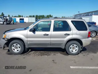 2001 Ford Escape XLS с VIN 1FMYU01B11KA16460, выставлен на аукционе IAAI как лот 42346546 с пробегом 264 160 миль миль и . История ставок и продаж доступна на DreamBid. Изображение 14.