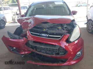 2014 Ford C-Max SEL z VIN 1FADP5BU9EL501457, wystawiony jako IAAI lot #42315415 z przebiegiem 102 418 mil mil oraz . Historia ofert i sprzedaży dostępna na DreamBid. Obrazek 6.