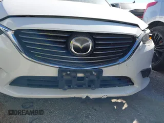 2017 Mazda 6 Grand Touring with VIN JM1GL1W57H1126716, listed as a IAAI auction lot 41619715 with 105,332 mi miles and . Bid and sale history available at DreamBid. Image 21.