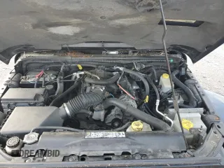 2011 Jeep Wrangler Sahara with VIN 1J4AA5D15BL552185, listed as a Copart auction lot 63065185 with 159,850 mi miles and Salvage title. Bid and sale history available at DreamBid. Image 11.