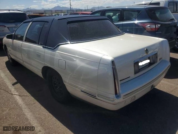 1997 Cadillac DeVille with VIN 1G6KD54Y8VU256755, listed as a Copart auction lot 77669854 with 153,808 mi miles and Clean Title. Bid and sale history available at carsss.com. Image 3.