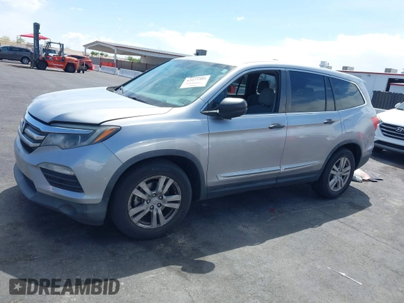 2016 Honda Pilot LX with VIN 5FNYF5H10GB044006, listed as a IAAI auction lot 42075404 with 129,642 mi miles and . Bid and sale history available at DreamBid. Image 14.